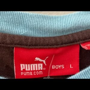 brown and blue Puma long sleeve tee